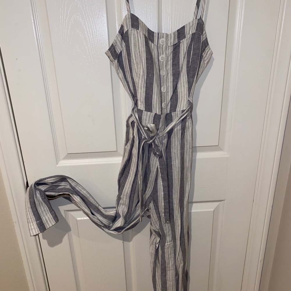 Blue and white striped jump suit with bow